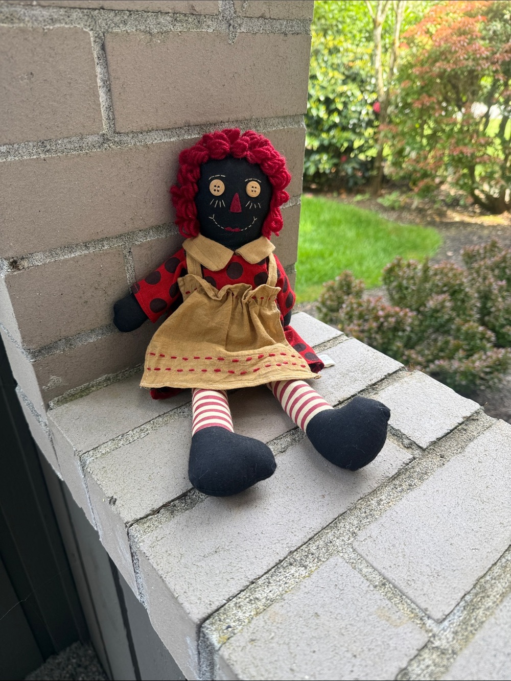 Rag Doll in Black, Red and tan dress